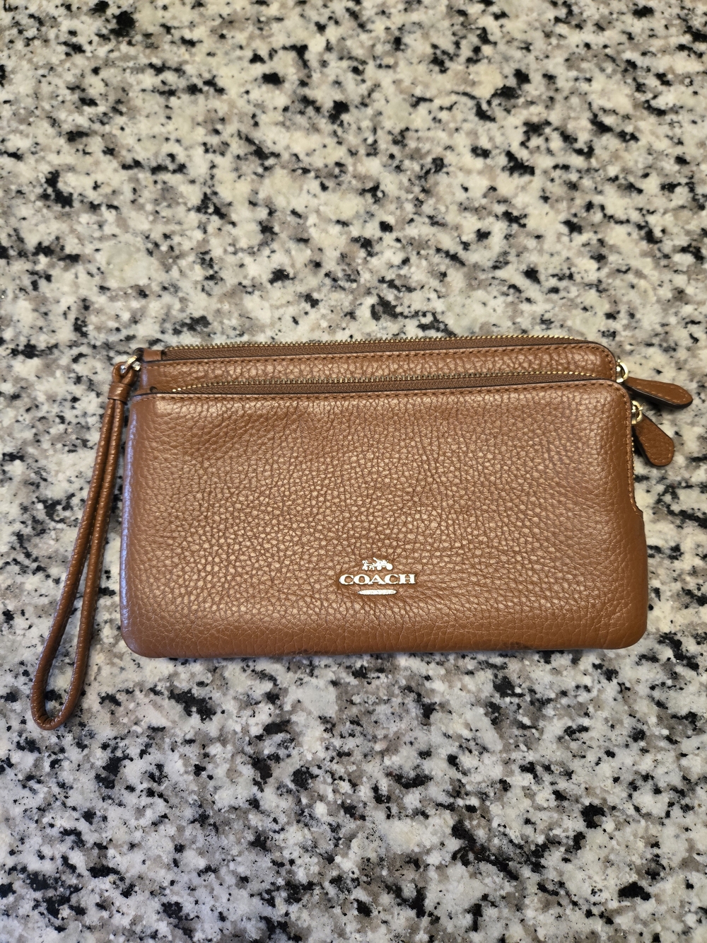 COACH Pebbled Leather Wristlet Clutch in Brown